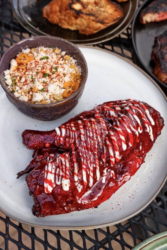 Lily Farms half chicken, mesquite-smoked and finished with a prickly pear glaze